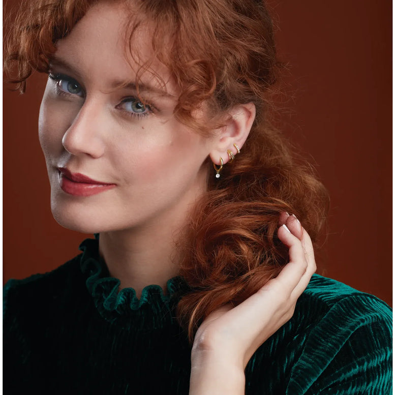 14K Rose Gold 1/8 CTW Natural Diamond Huggie Earrings