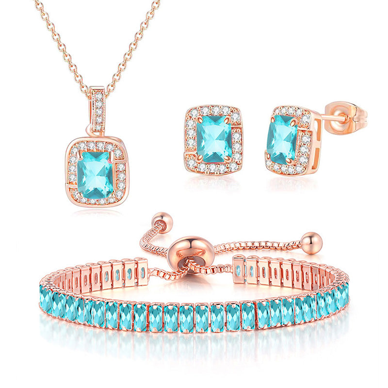 18K Rose Gold Created Aquamarine Princess Halo Pendant Necklace, Earrings and Tennis Bracelet Jewelry Set Plated